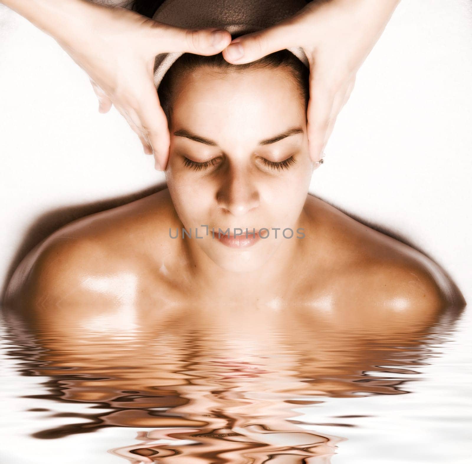 woman relaxing with a nice facial massage