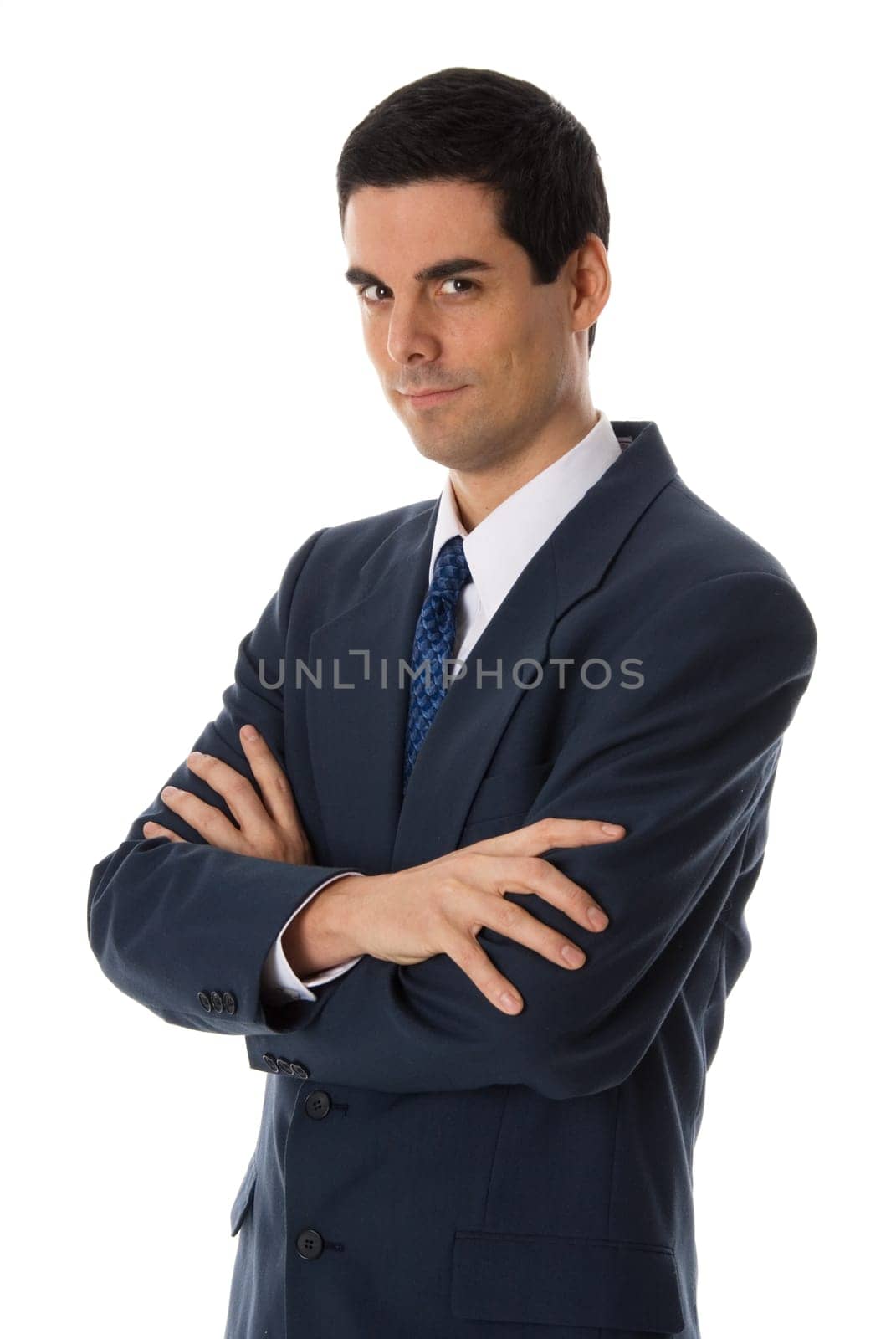 businessman in a blue suit with arms crossed