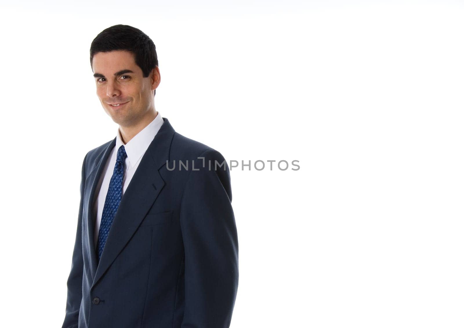 man in blue suit smiling on white background