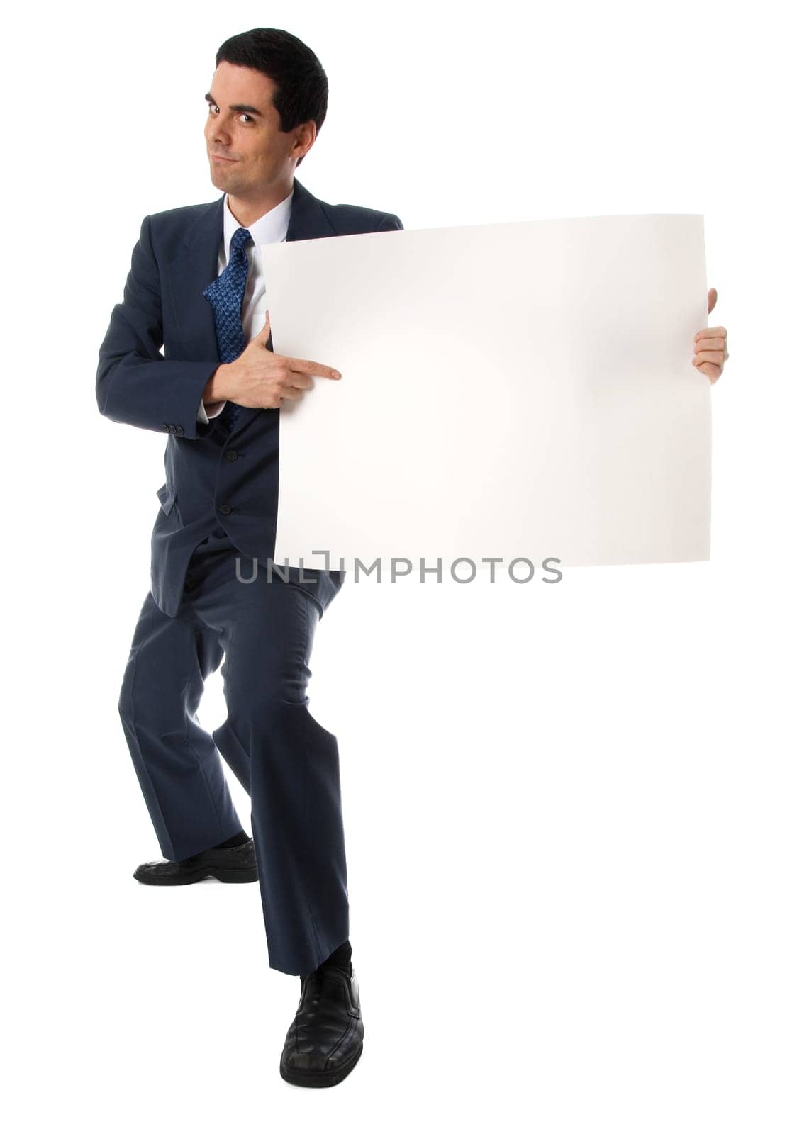 businessman in blue suit holding a white card
