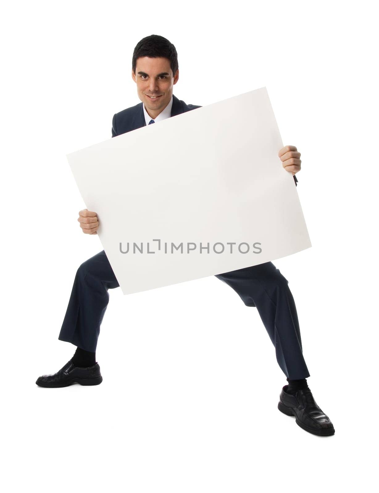 man in blue suit holding a blank card