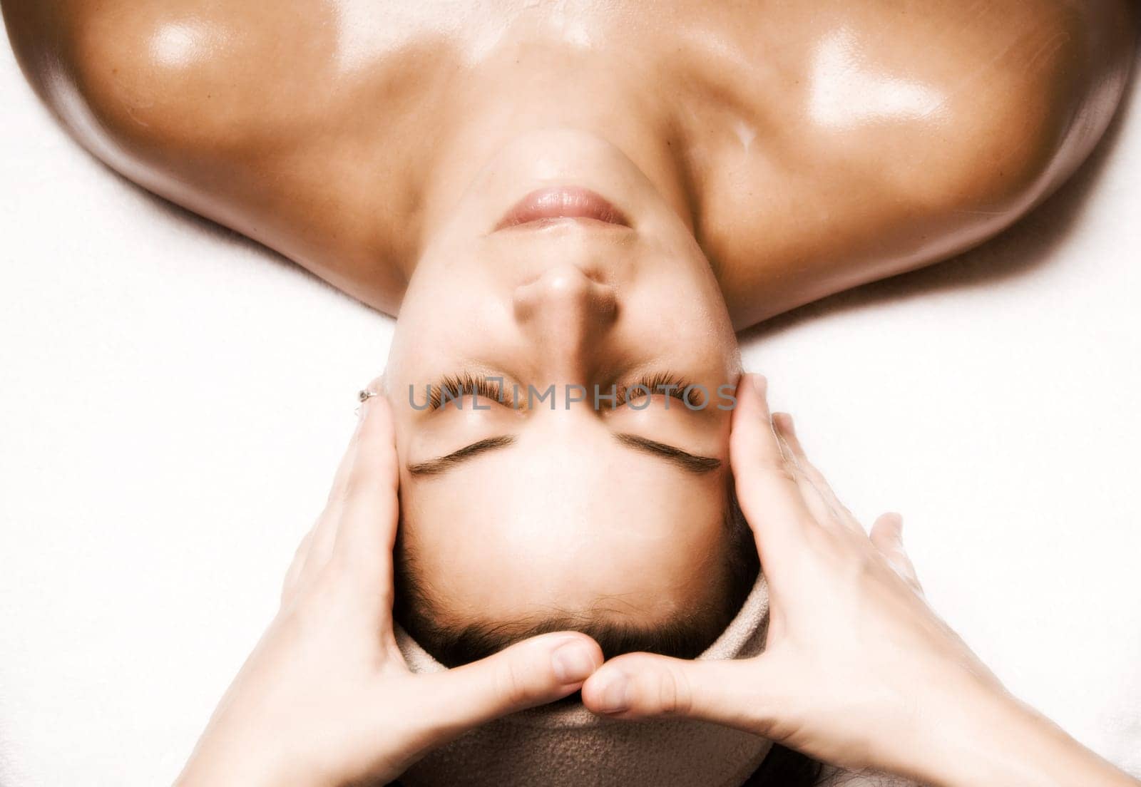 woman relaxing with a nice facial massage