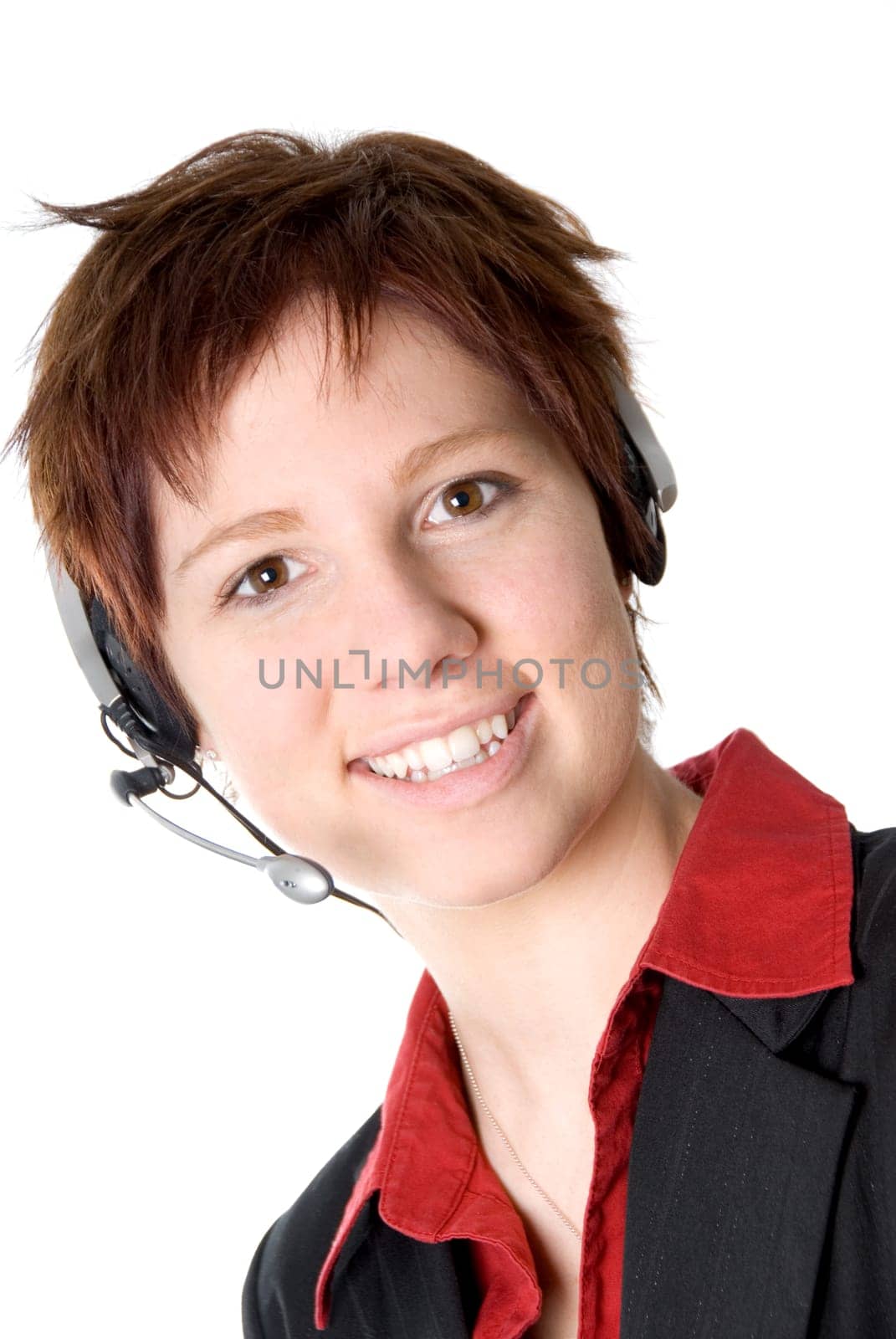 girl with headset smiling at the camera