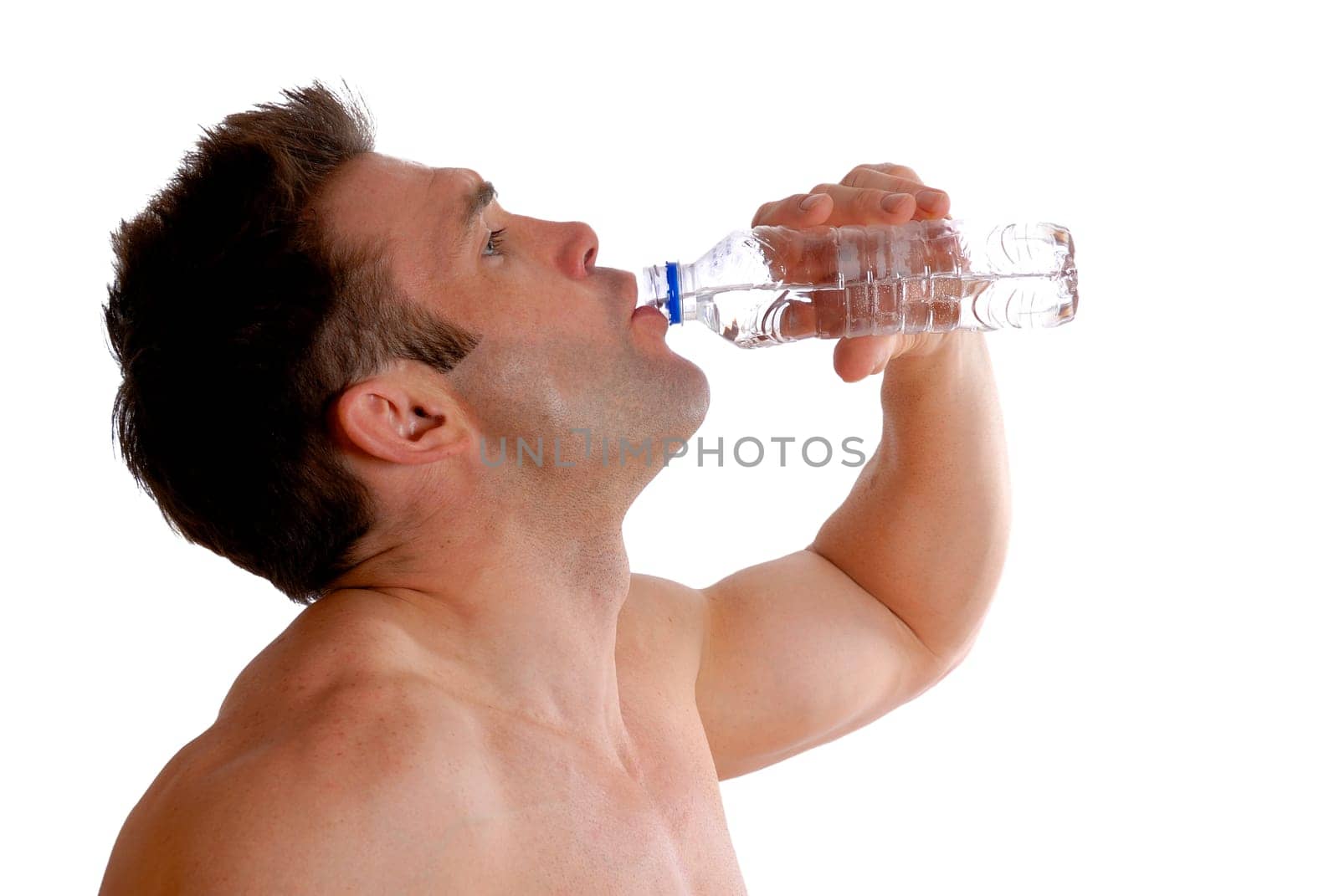 shirtless man doing a workout and drinking a bottle