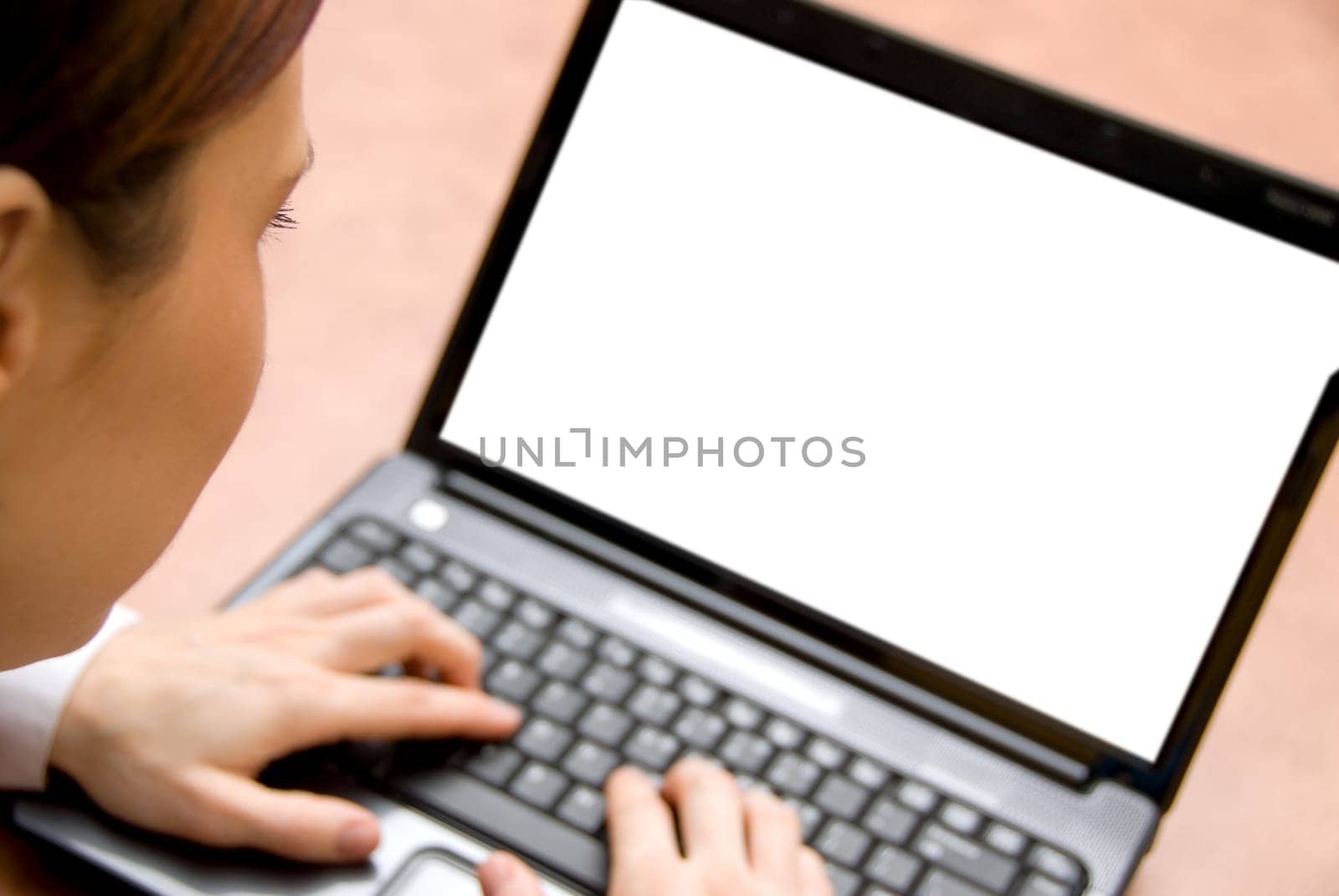 business woman on her laptop with focus on face