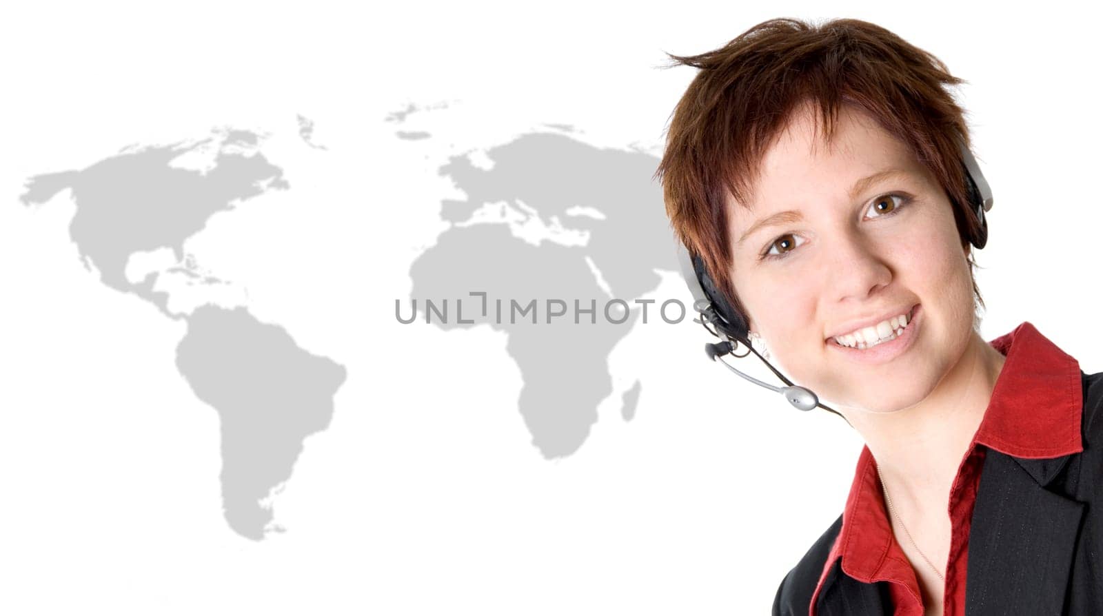 Business Women headset on a world map laptop