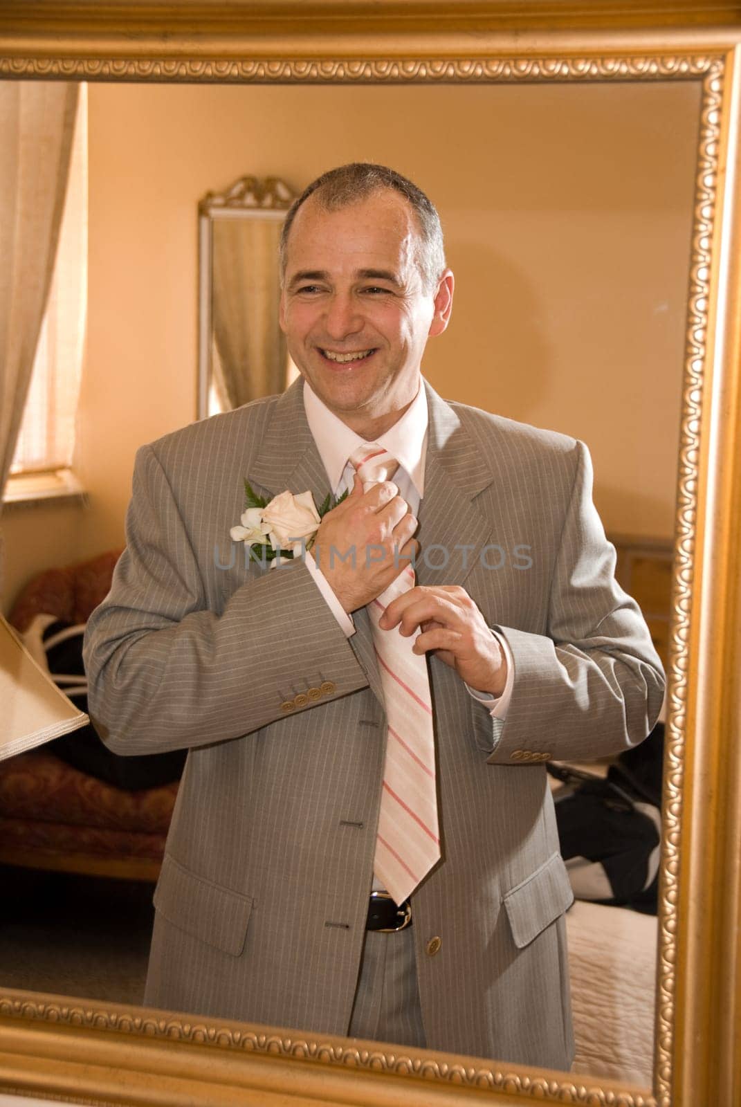 a groom getting ready for the big day