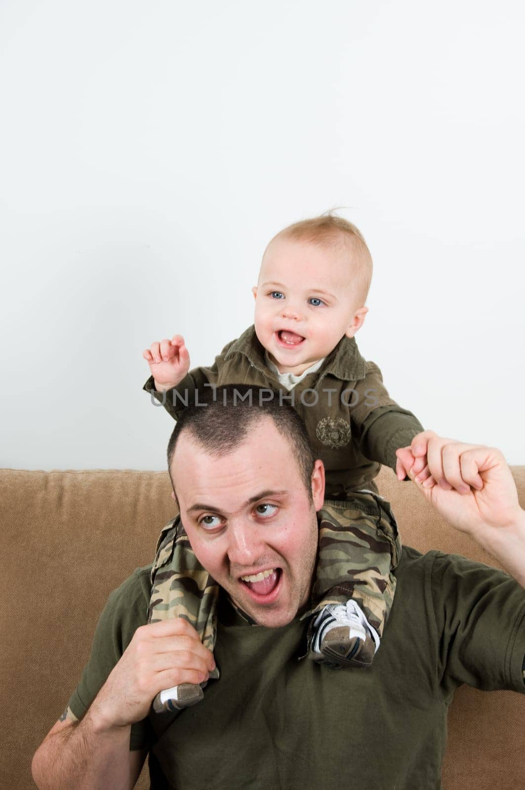 father with his young baby boy son