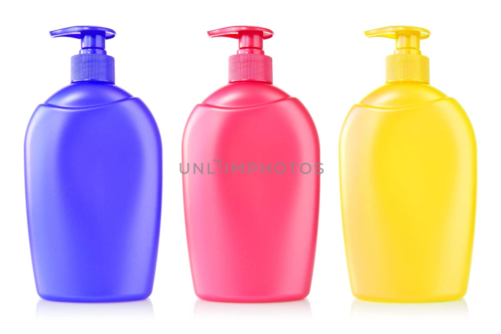 three color plastic bottles with liquid soap