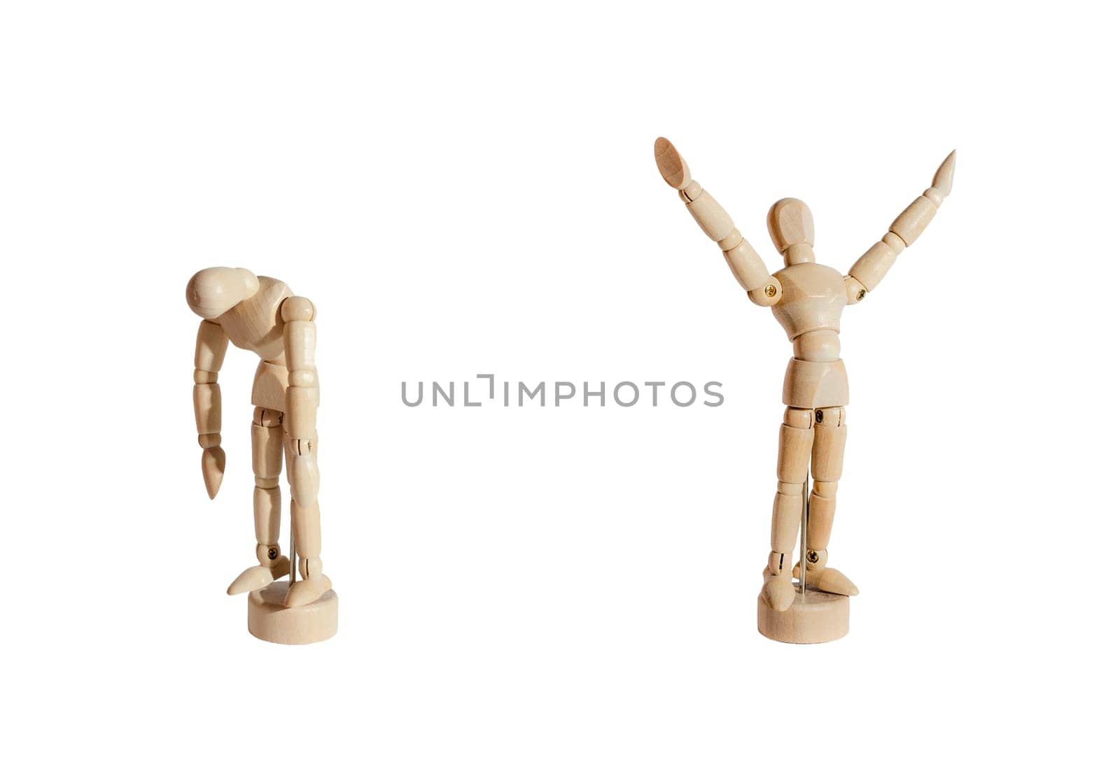 Two wooden mannequins, one celebrating and the other sad, against white background.