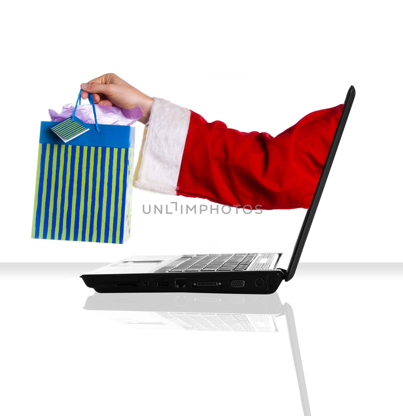 a single laptop on a white table and background xmas