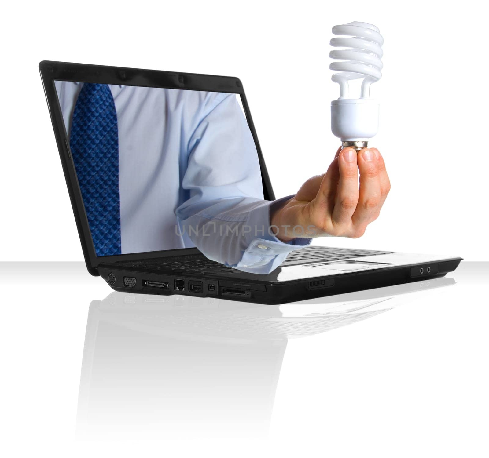 A hand holding a new energy saving light bulb