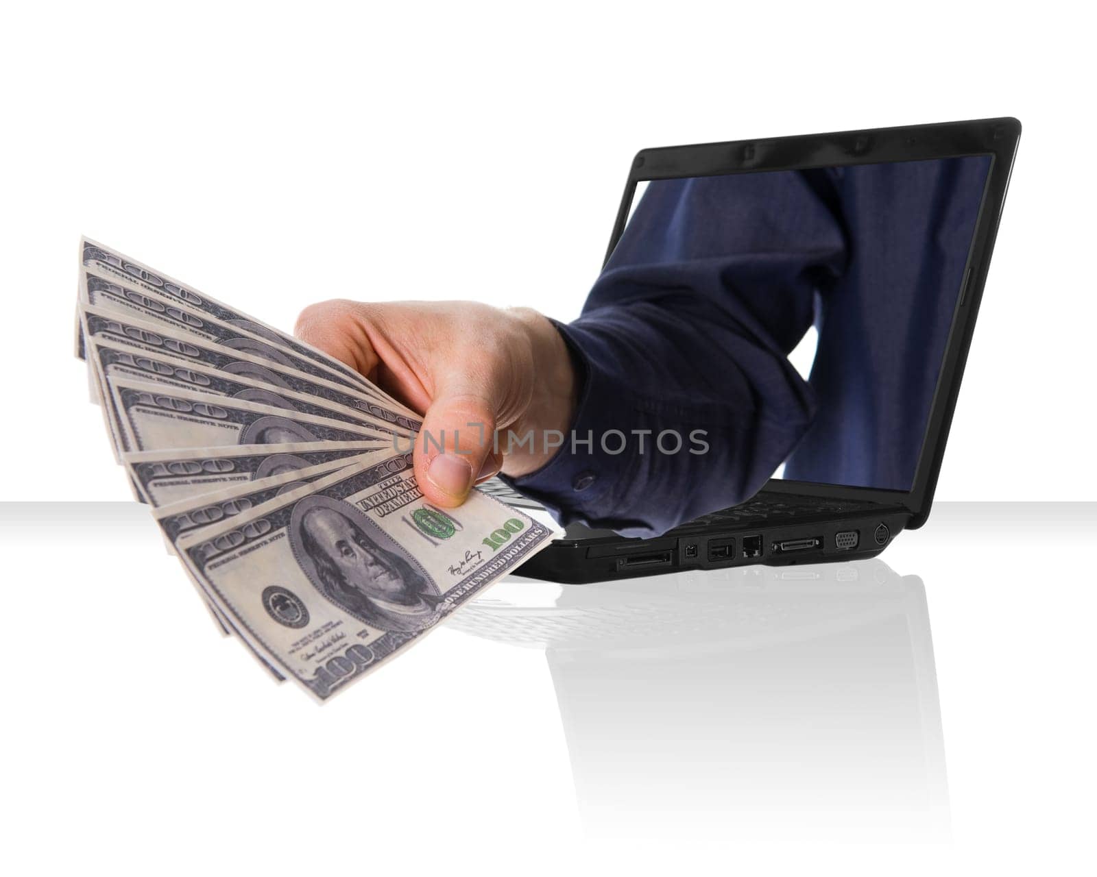 a black laptop computer with a hand and money