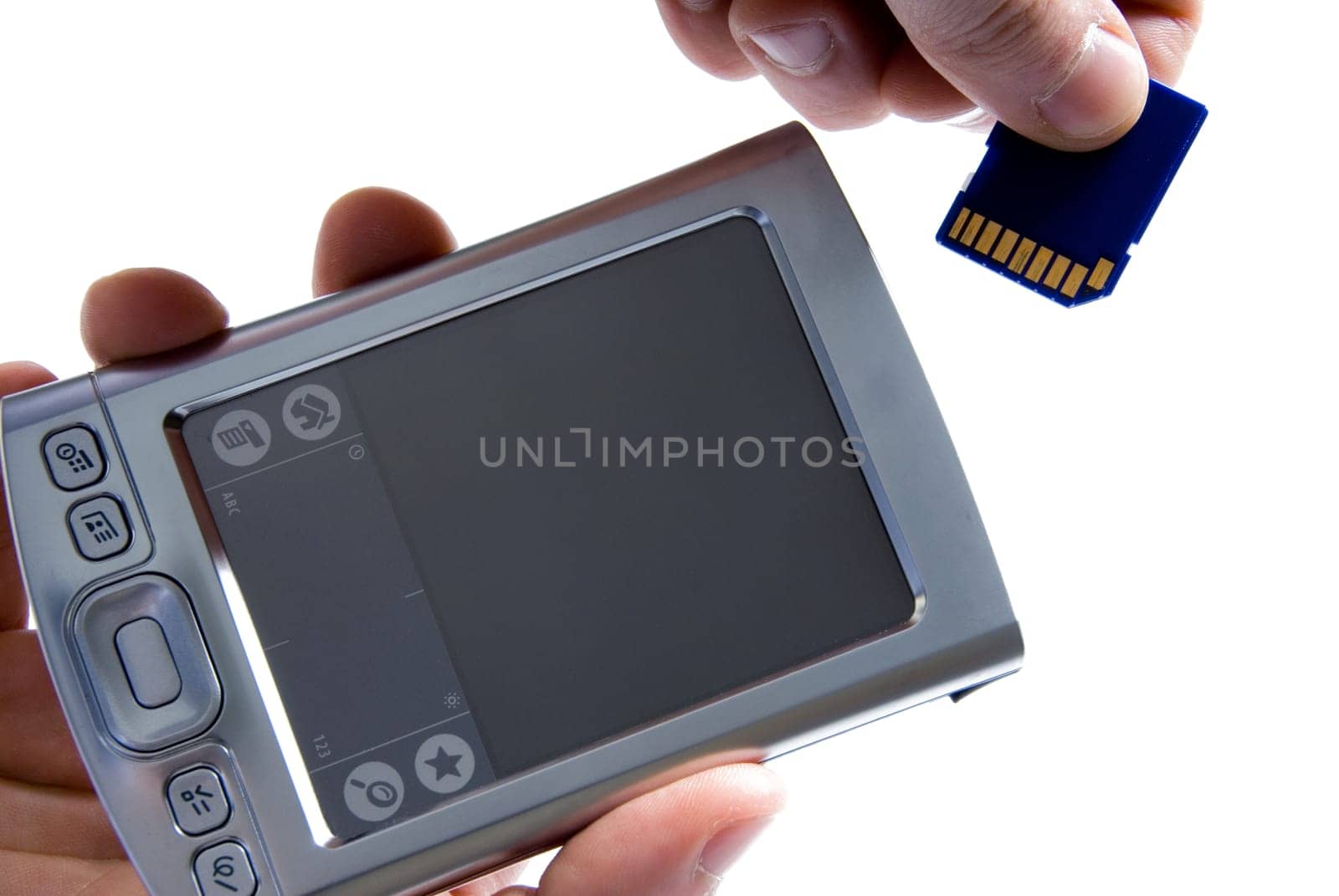 Paml with hand inserting SD card