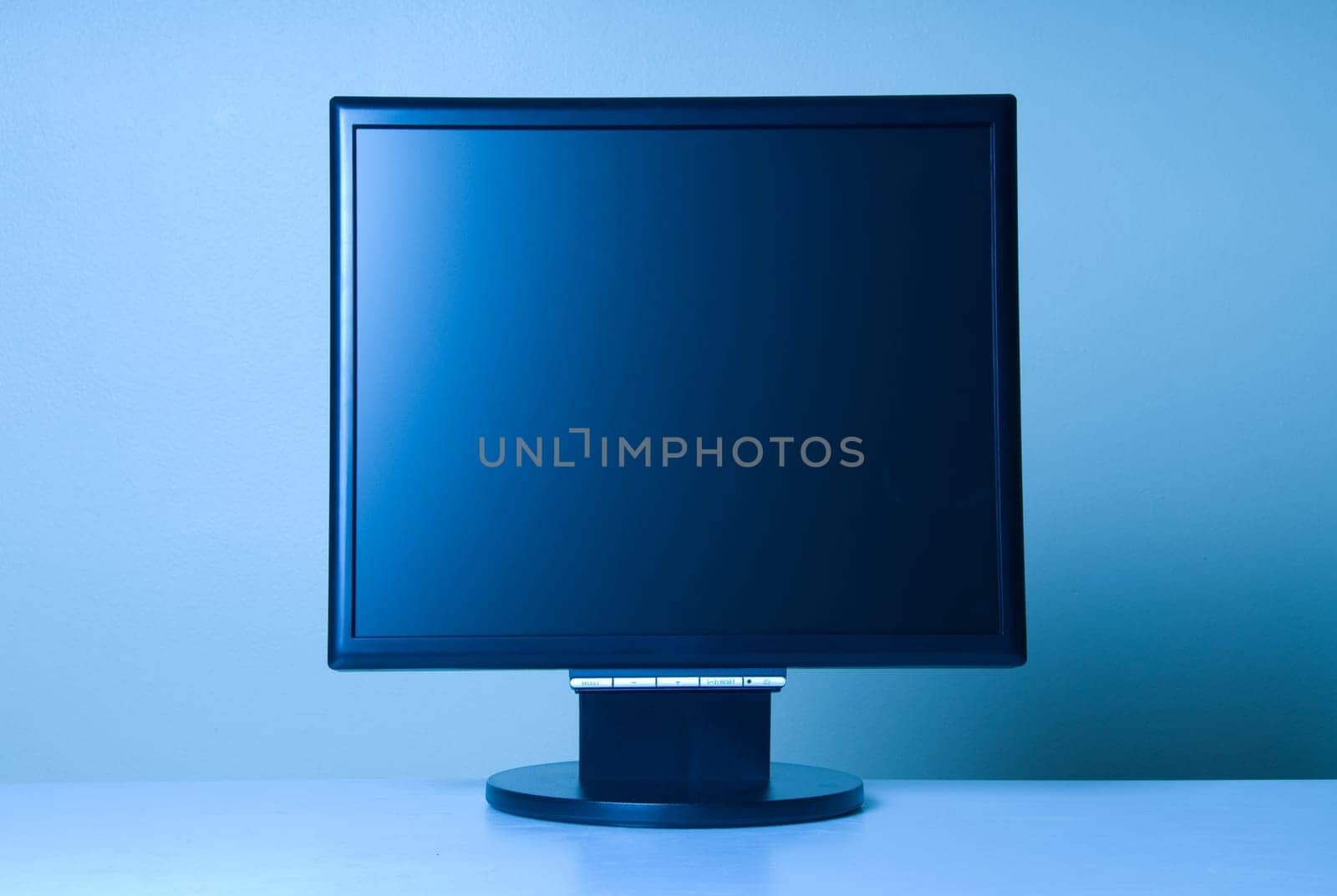 stand alone computer screen on blue