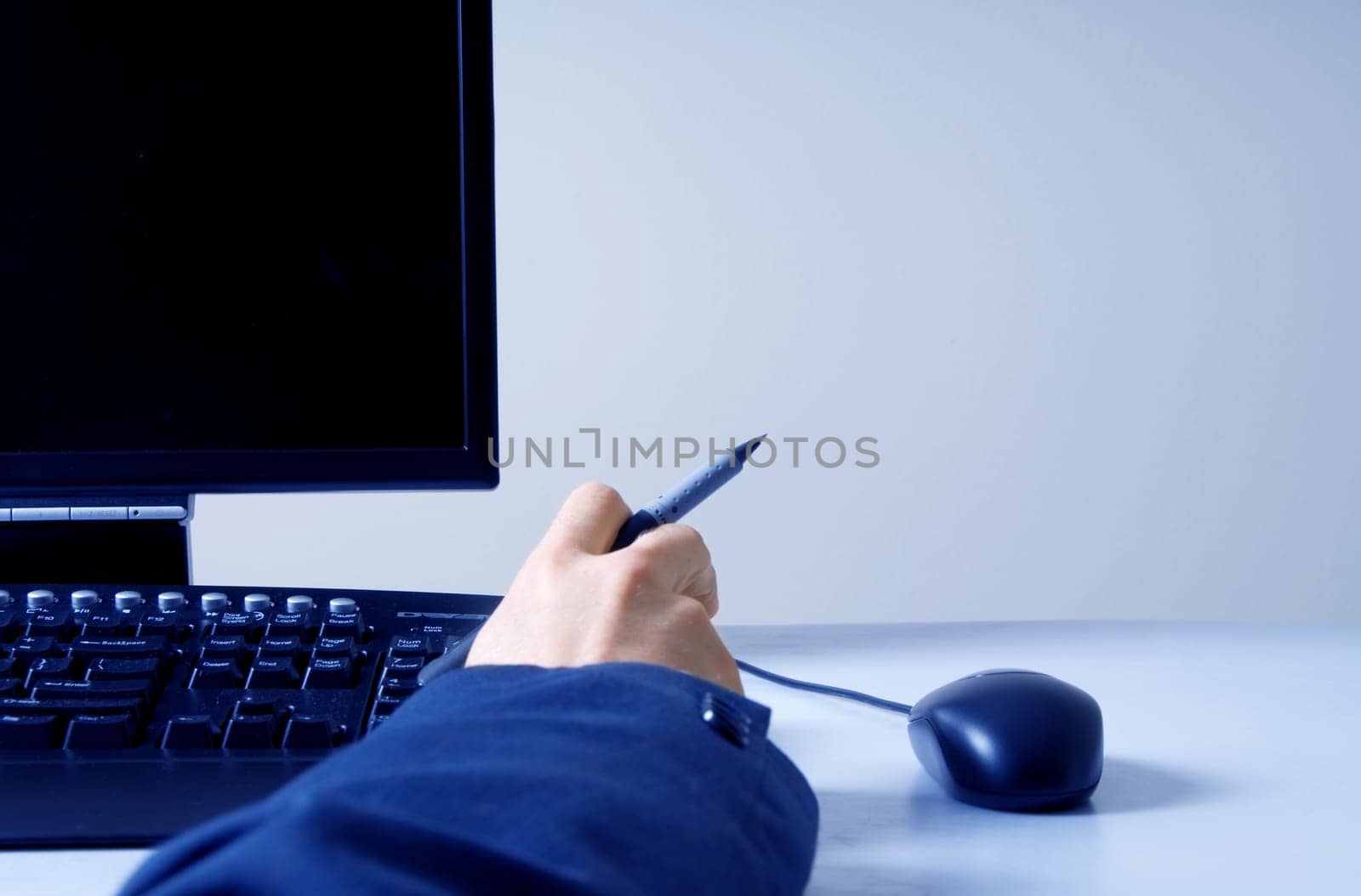 businessman in front of a computer