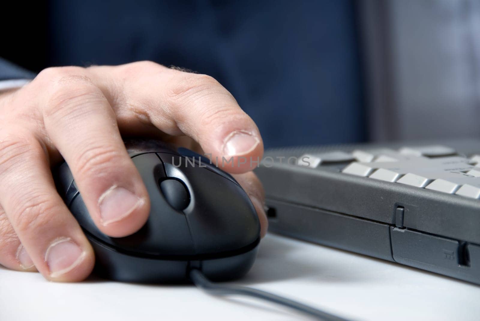 laptop with hand and mouse