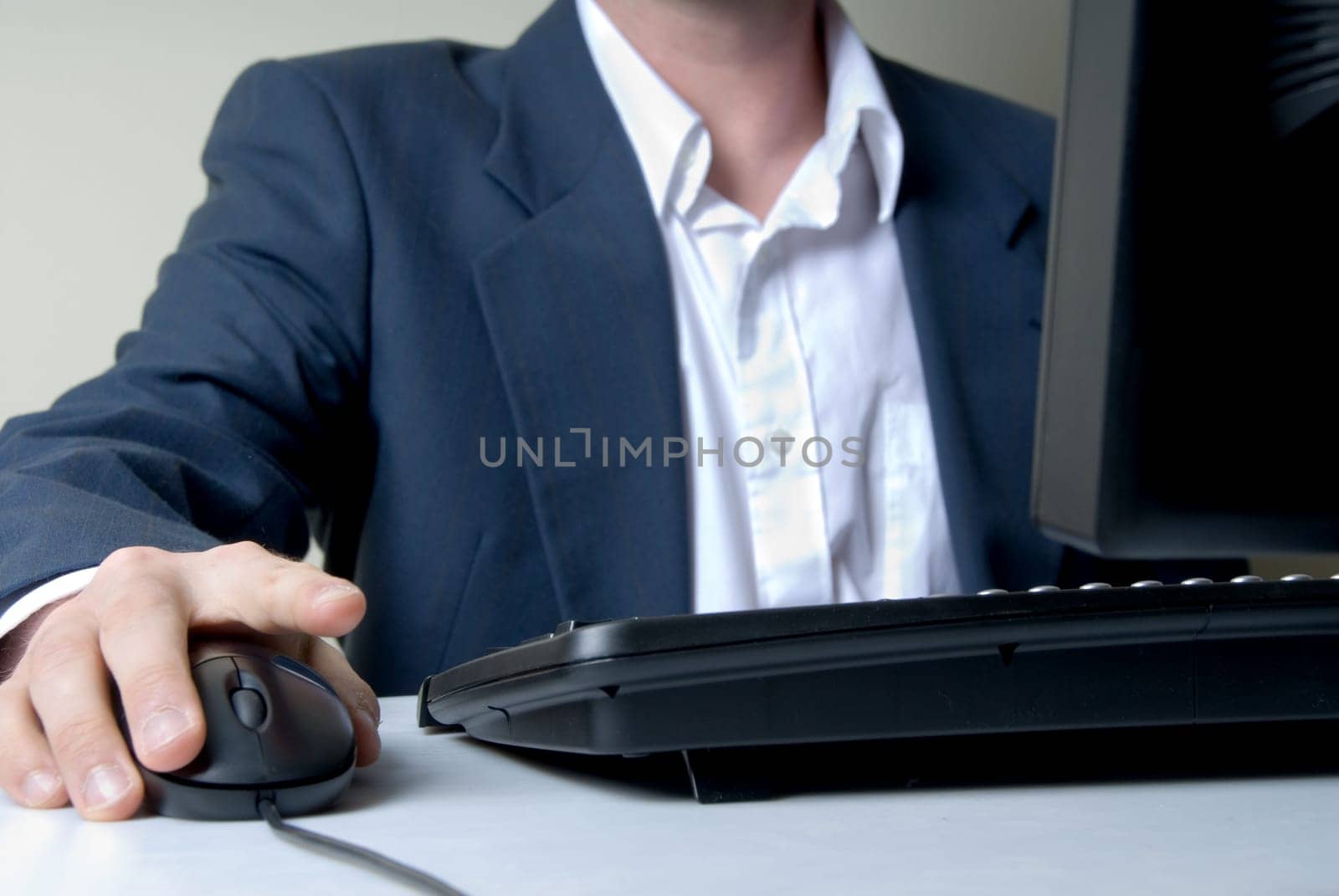 businessman on the computer with mouse