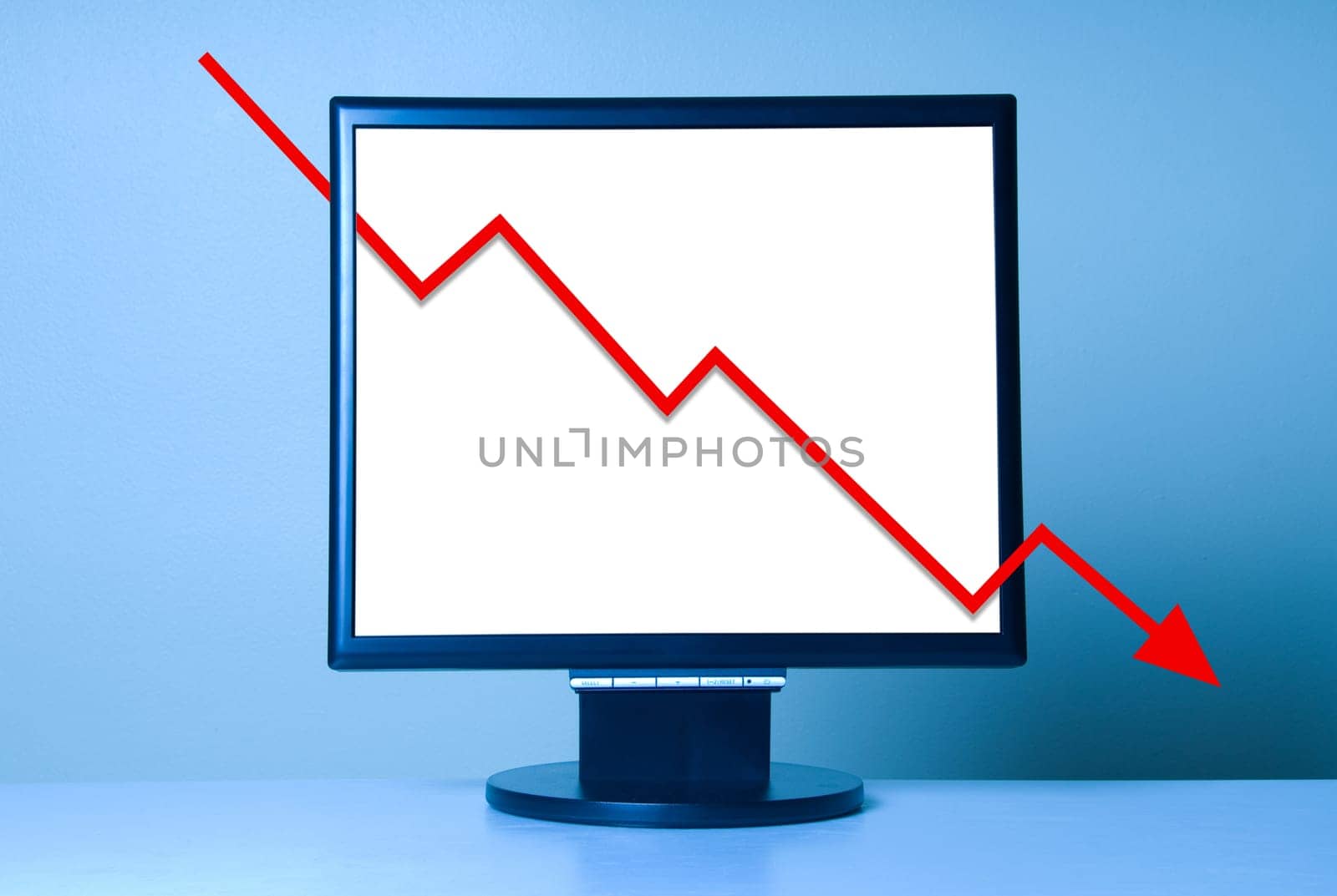 Economic Crisis shown with a red arrow graph on monitor