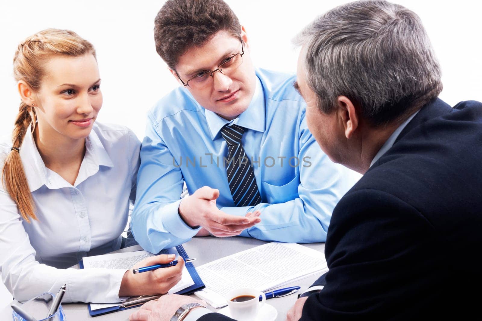 Image of two businesspeople speaking something to their boss