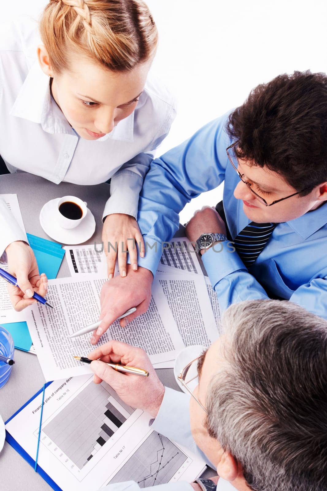 Image of two businessmen advise young colleague