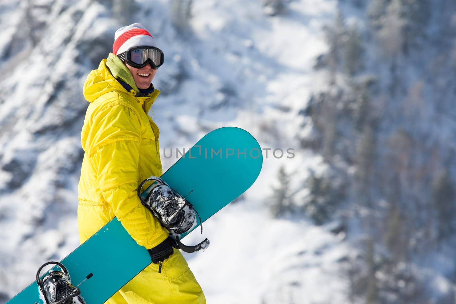 Portrait of happy sportsman smiling at camera