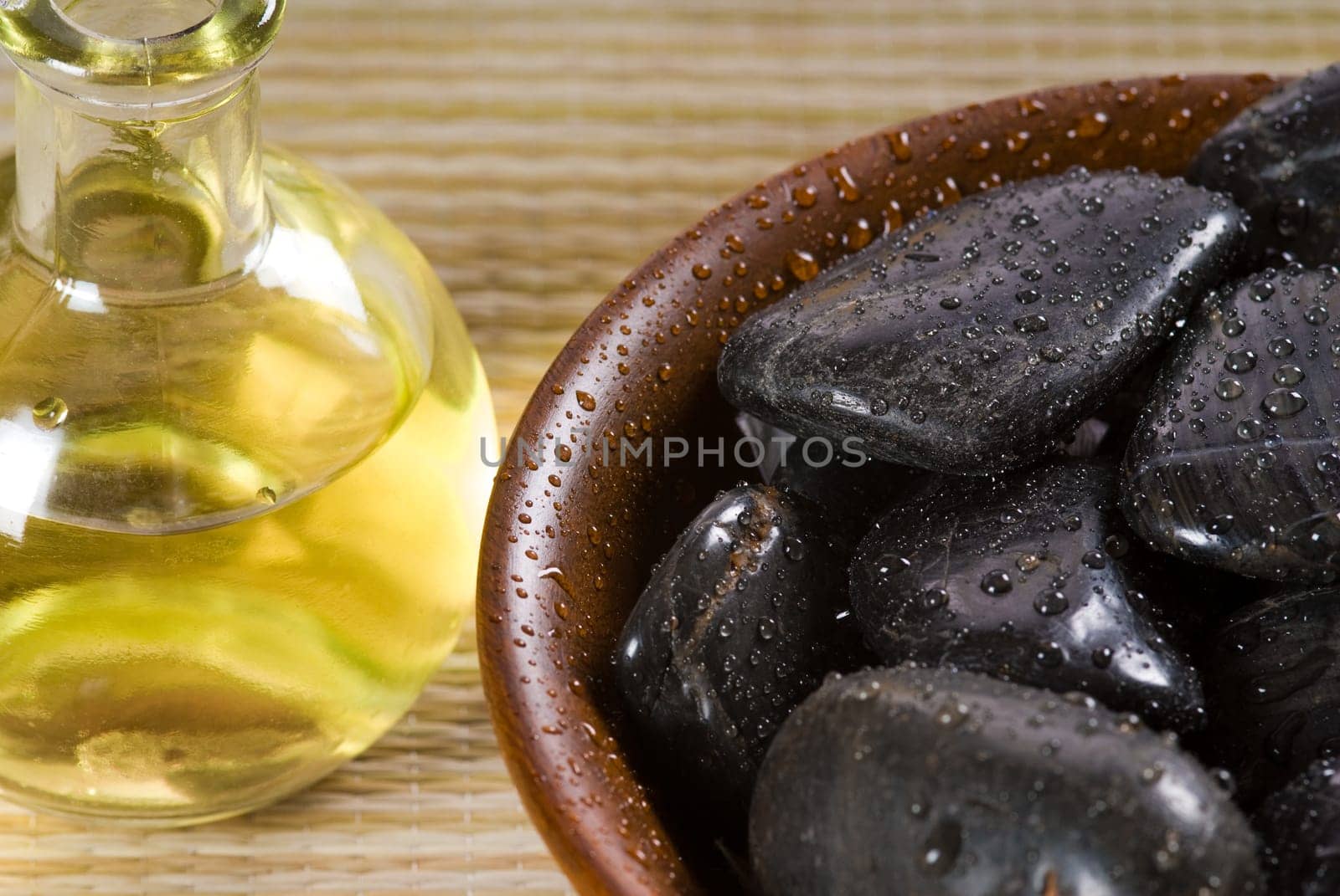 bowl of hot stones for lastone massage