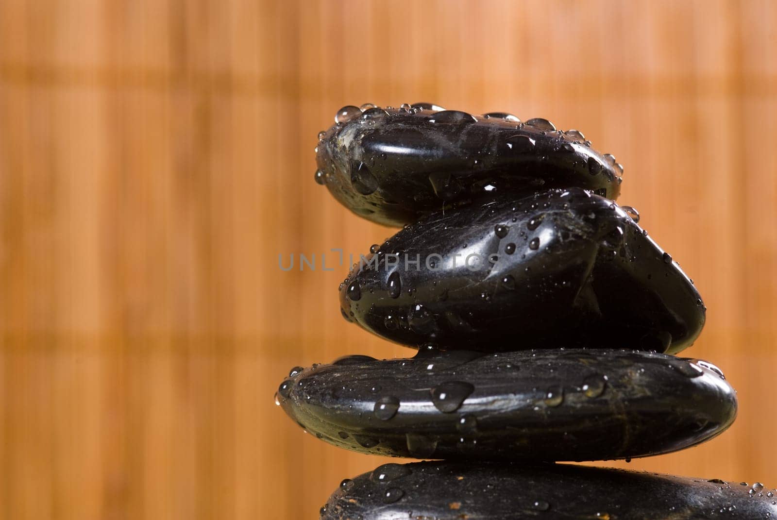 stack of hot stones for lastone massage