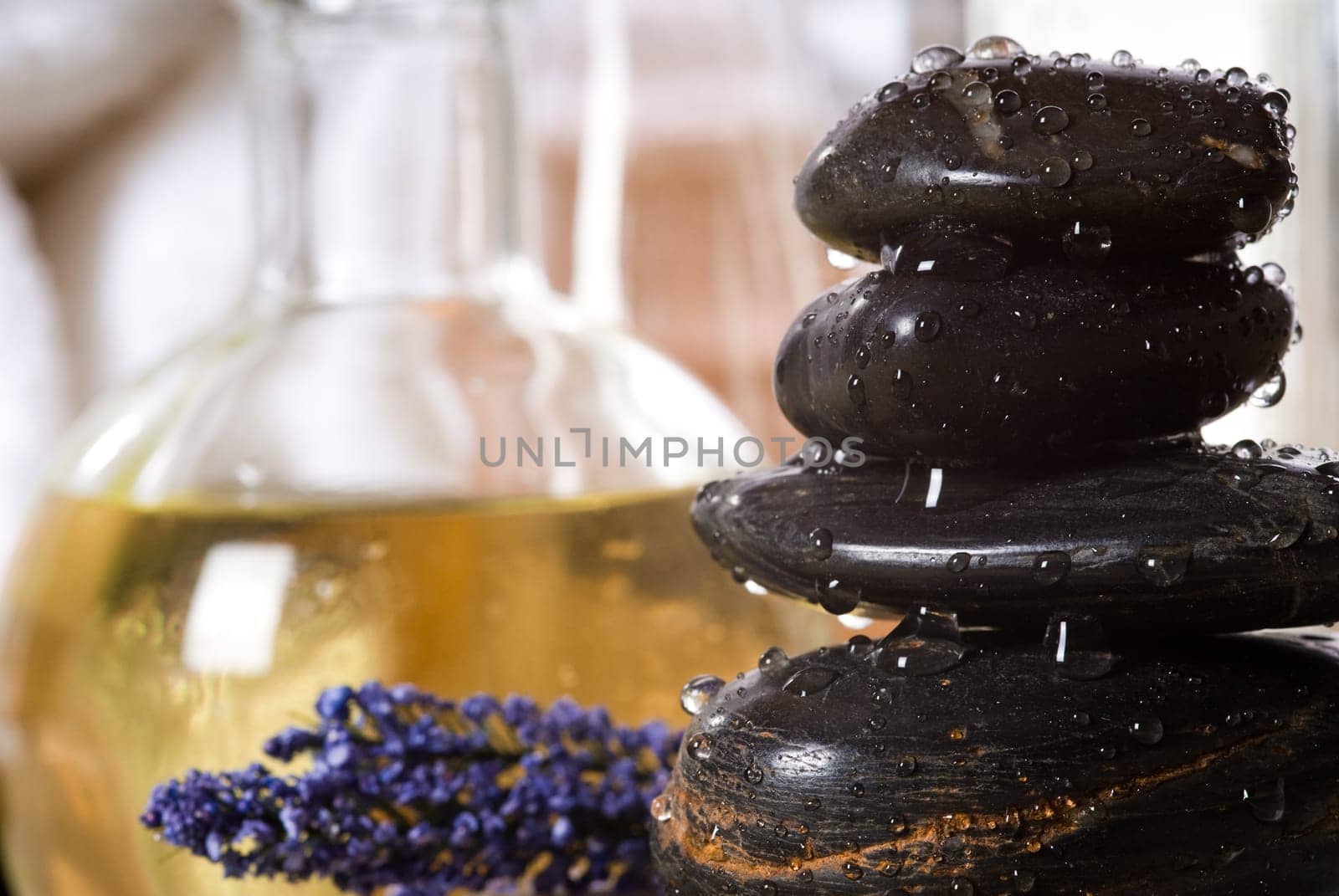 massage stones and towels spa tools and oil