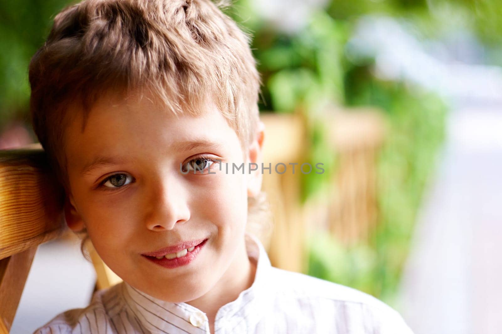 Portrait of handsome boy looking at camera
