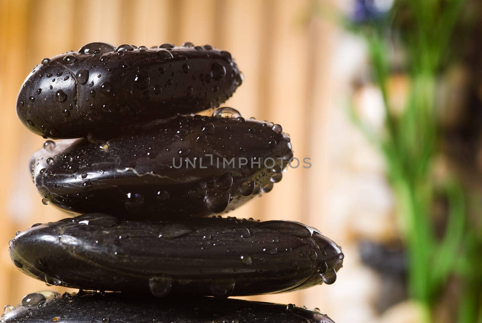 stack of hot stones for lastone massage