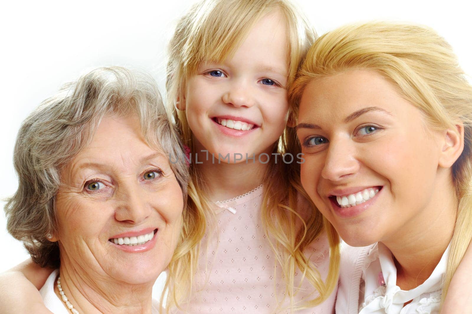 Photo of little girl with her grandmother and mother