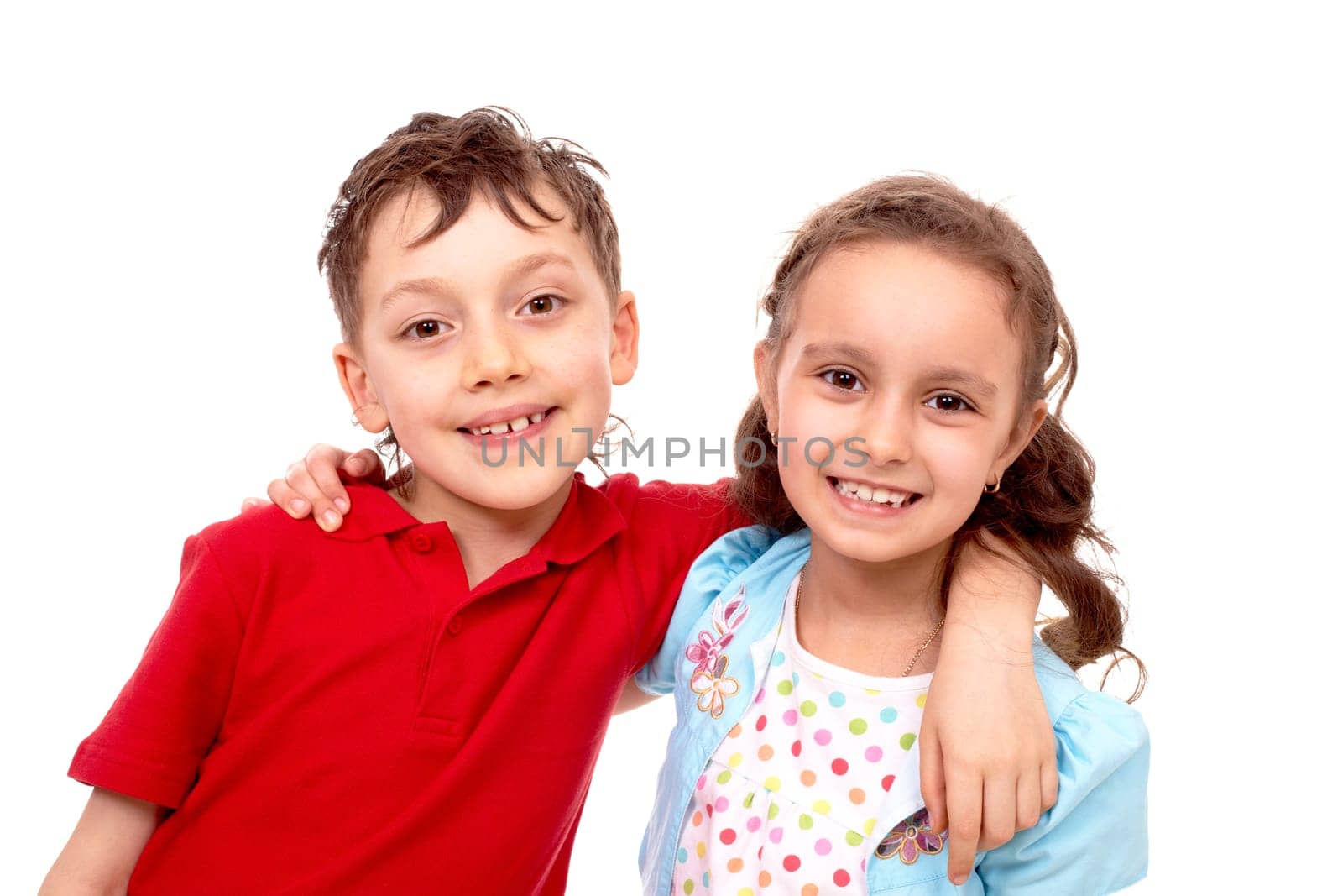 Portrait of smart friends embracing and looking at camera