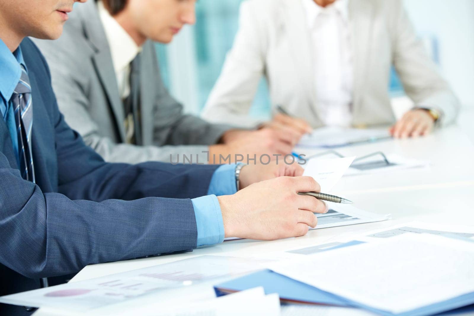 Human hands during paperwork in office