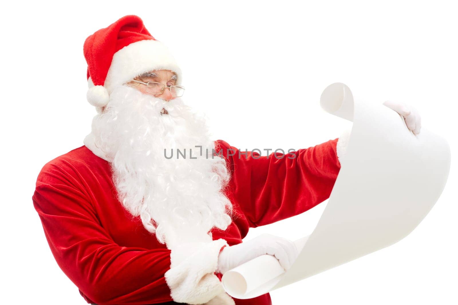 Portrait of Santa Claus reading big letter attentively