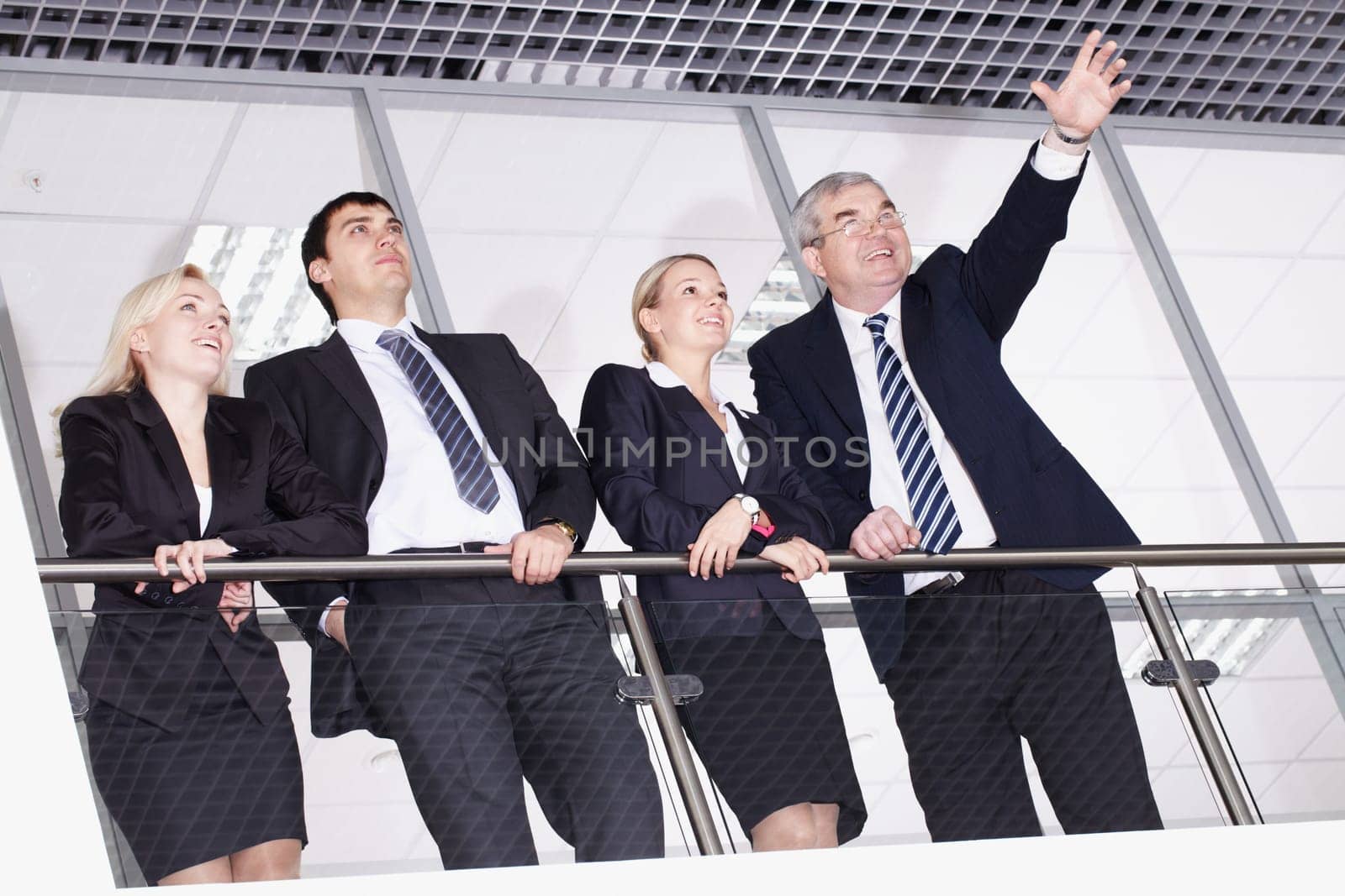 Group of businesspeople with their senior boss