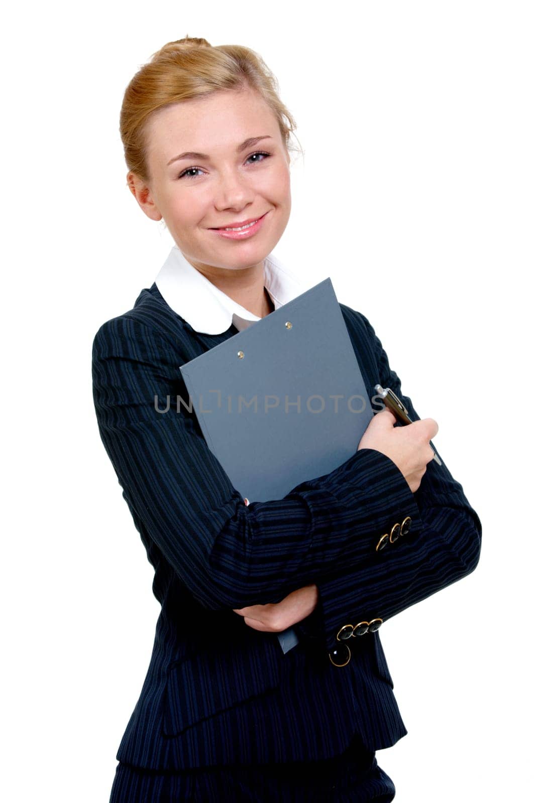 Photo of pretty employee with folder and pen in hand smiling and looking at camera