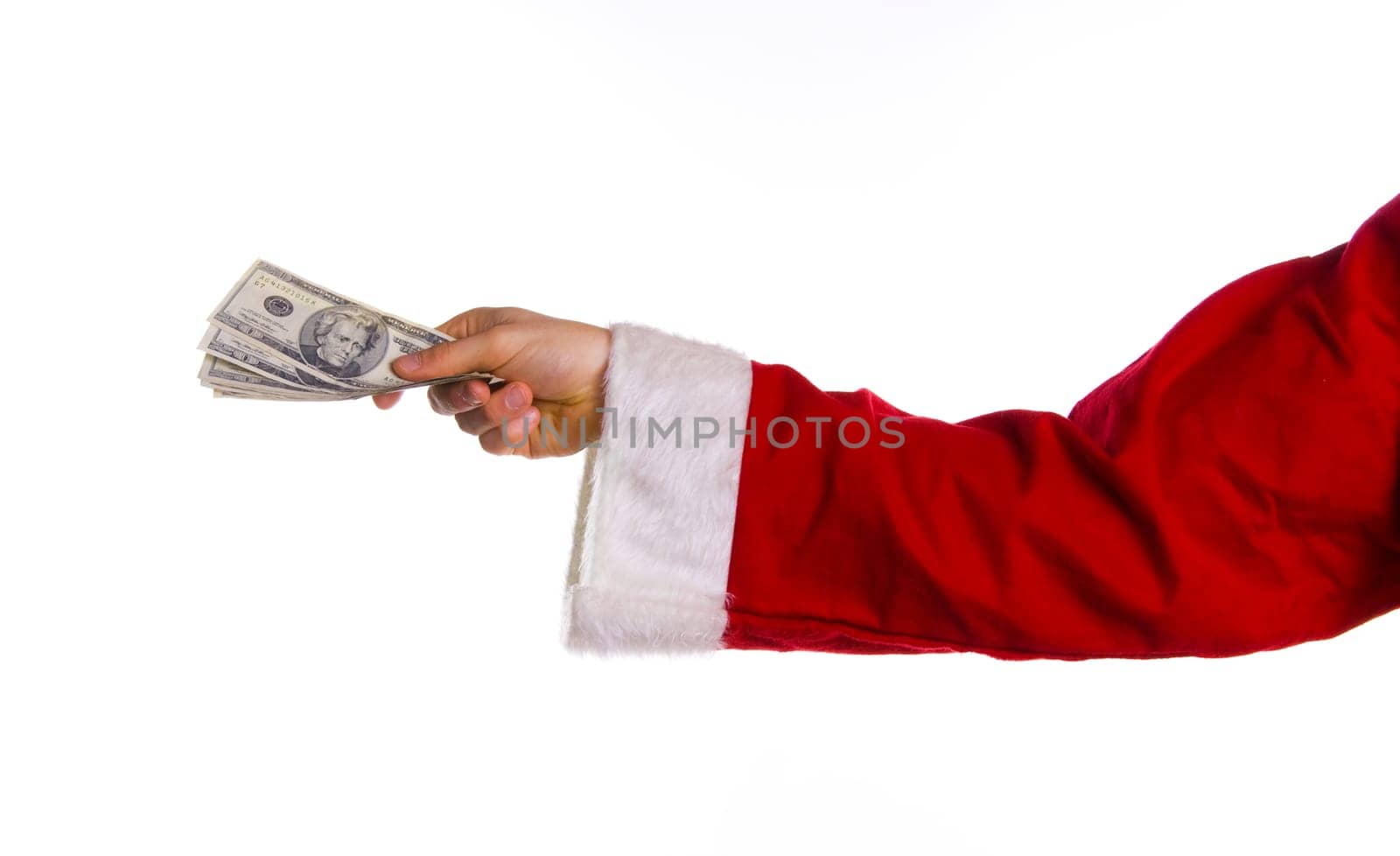 santa hand with some us money on white