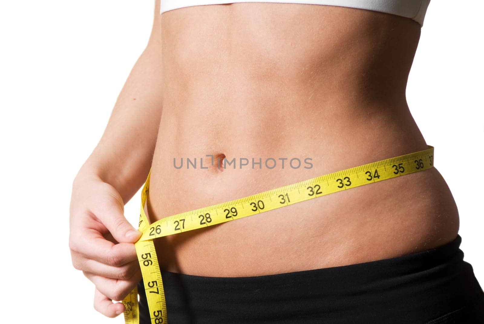 Woman with a tape measure at the waist