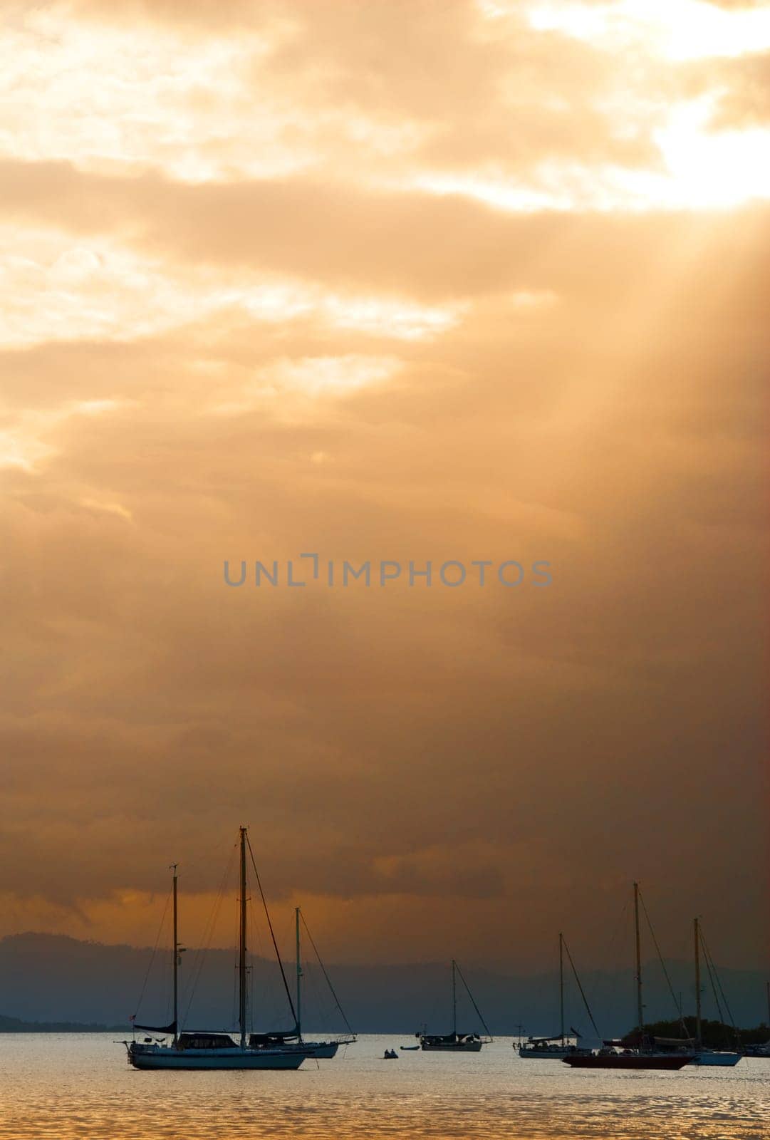 some sail boats in a bay in panama
