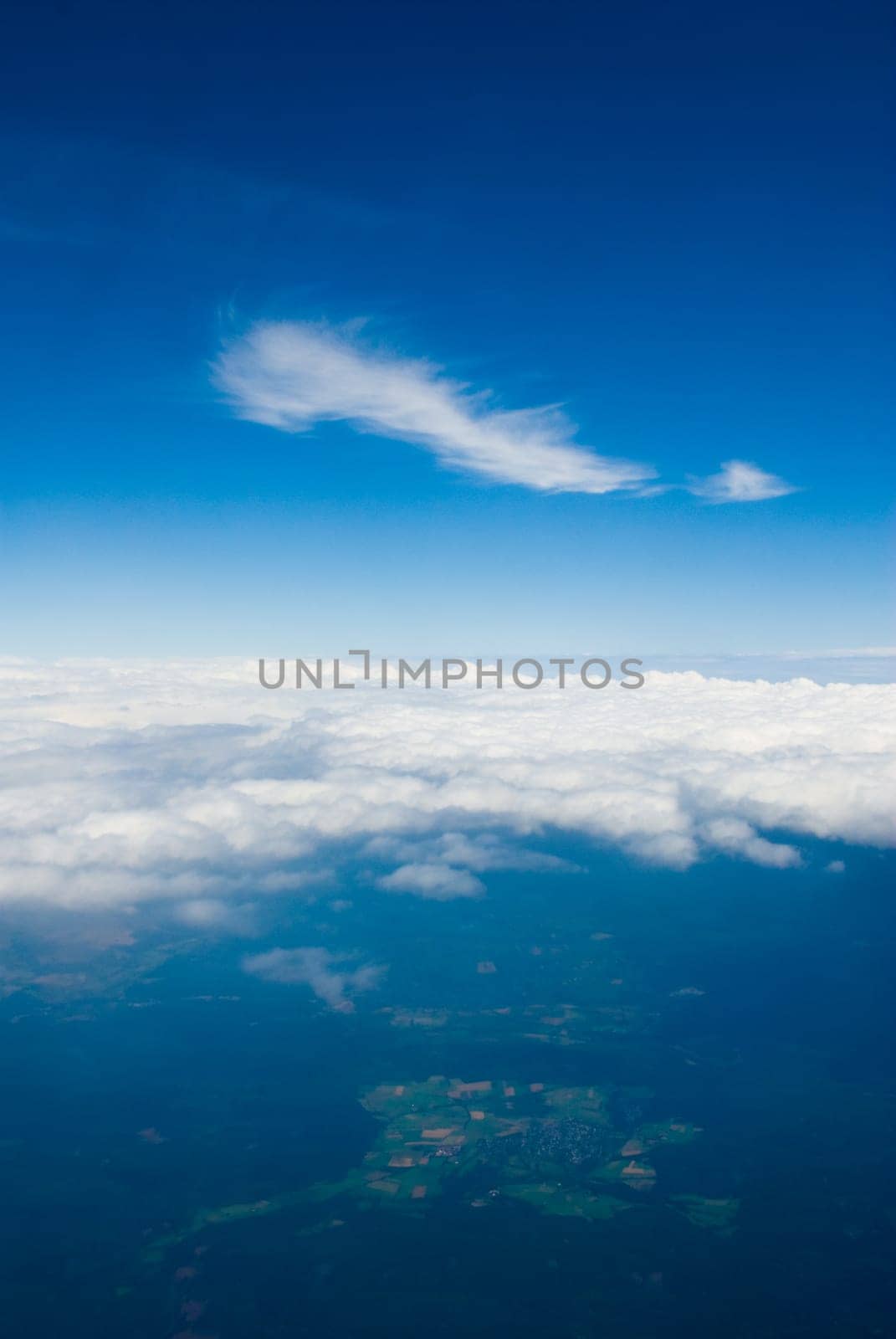 high in the clouds in a plane