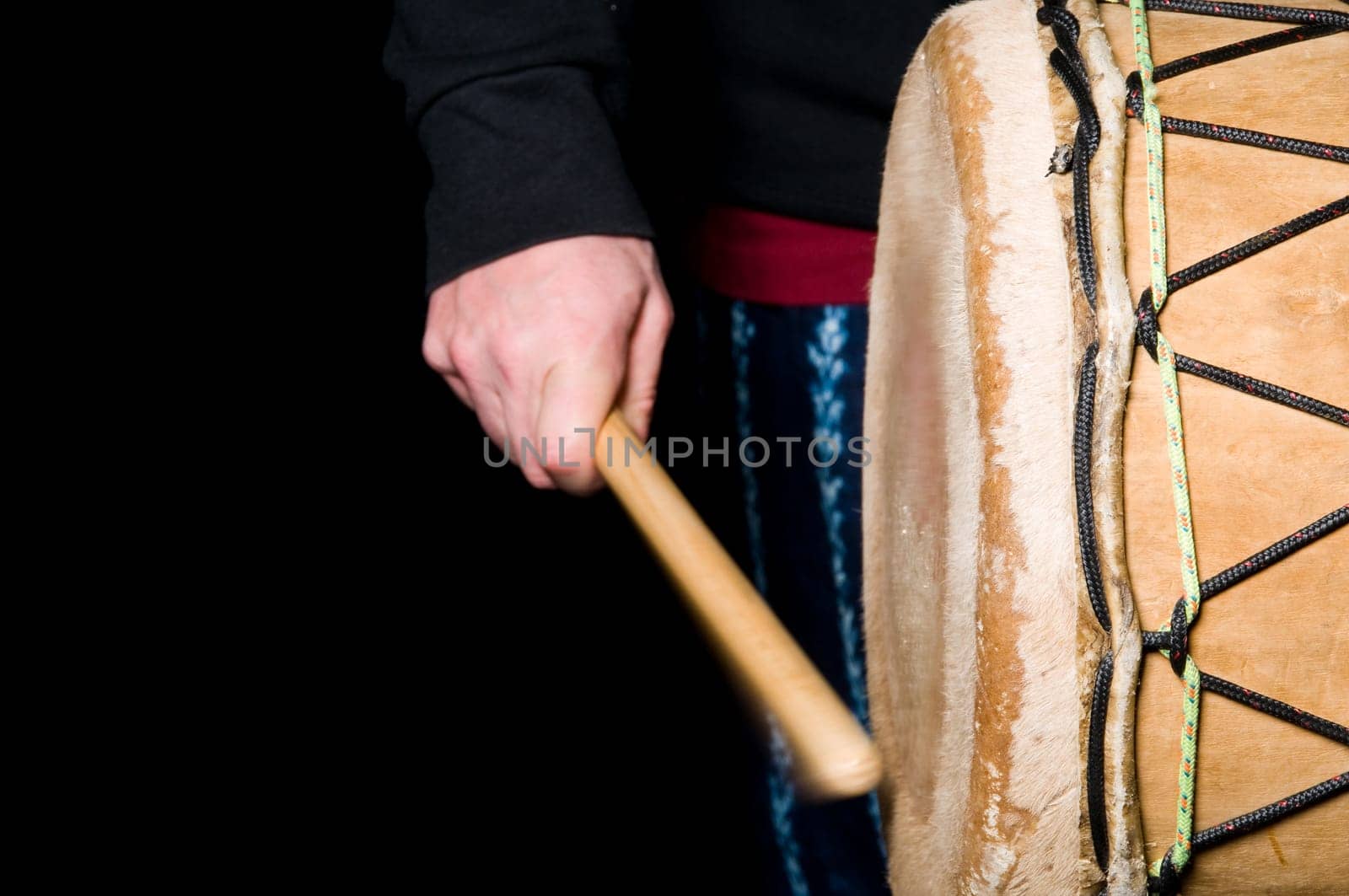 one musician playing drums in a studio