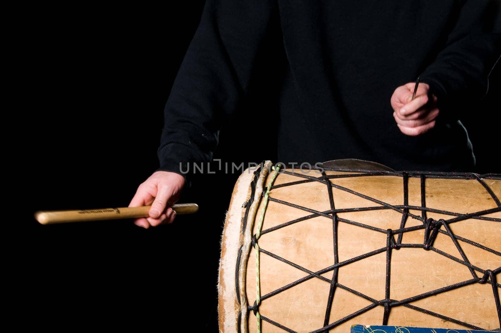 one musician playing drums in a studio