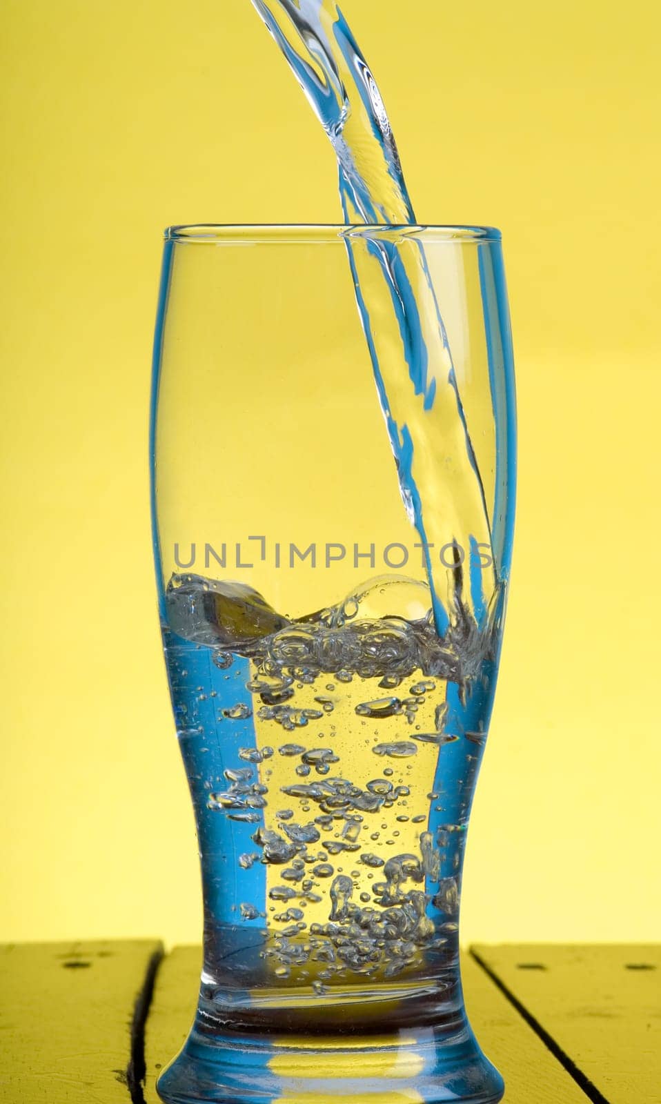 pouring water in a glass