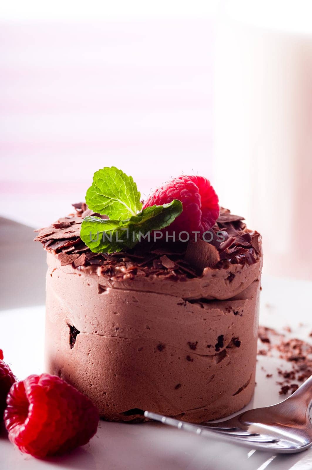 Chocolate Moose dessert on a white plate with milk