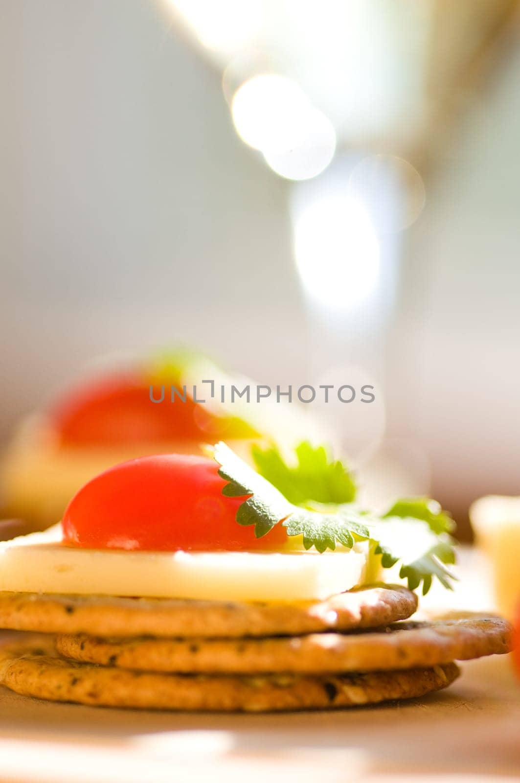 cheese and crackers on a cutting board