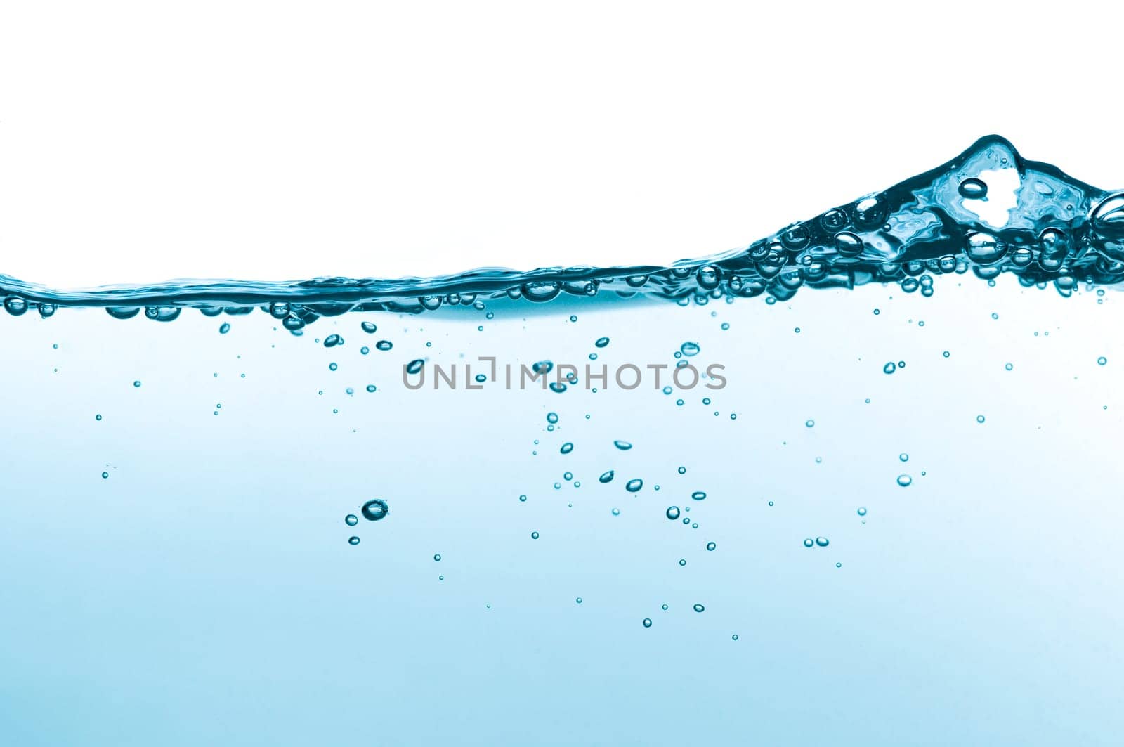 wave of pure blue water in an aquarium
