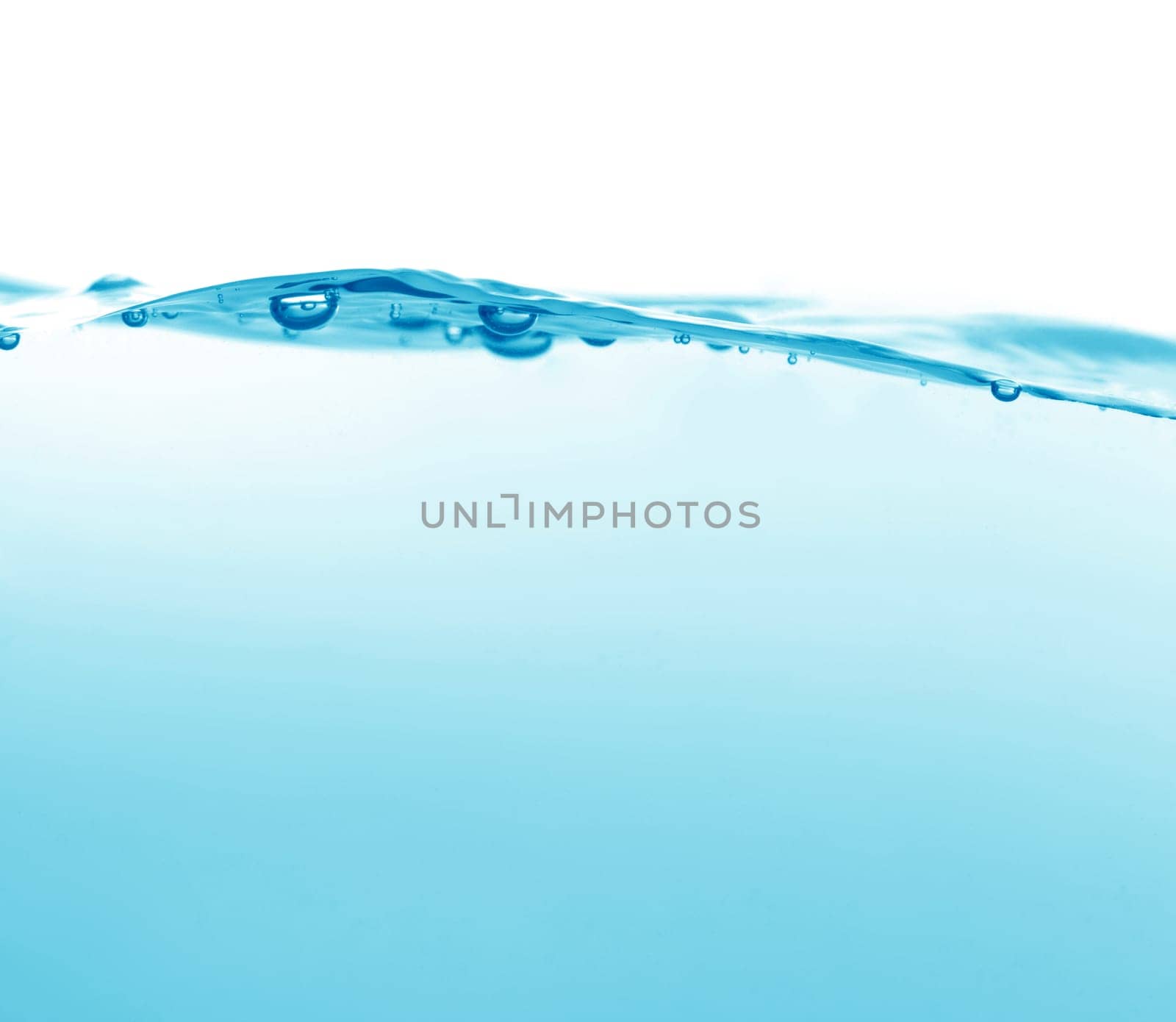 wave of pure blue water in an aquarium