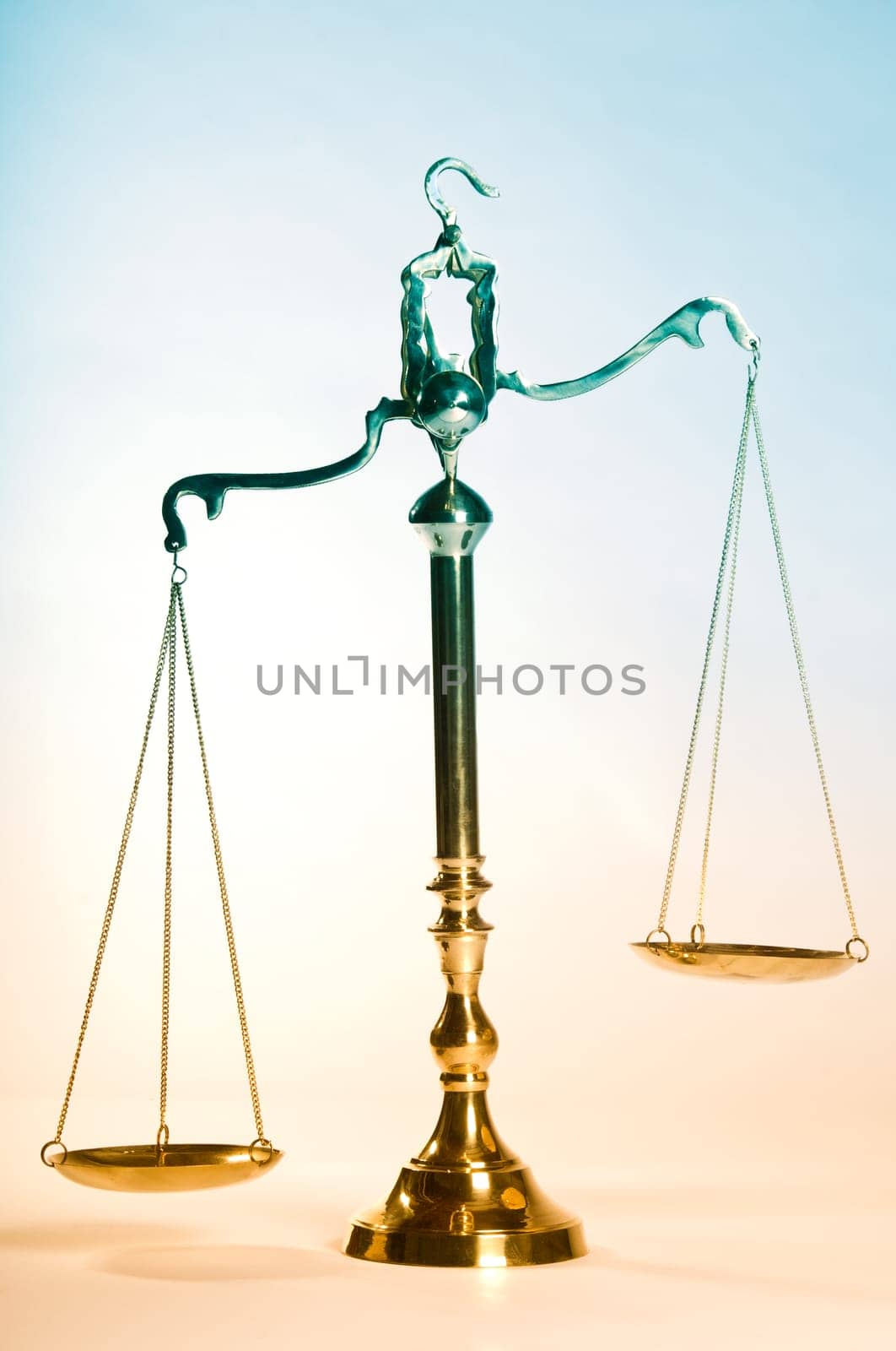 Wooden justice gavel and block with brass