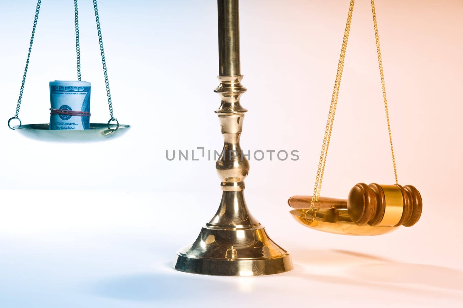 Wooden justice gavel and block with brass